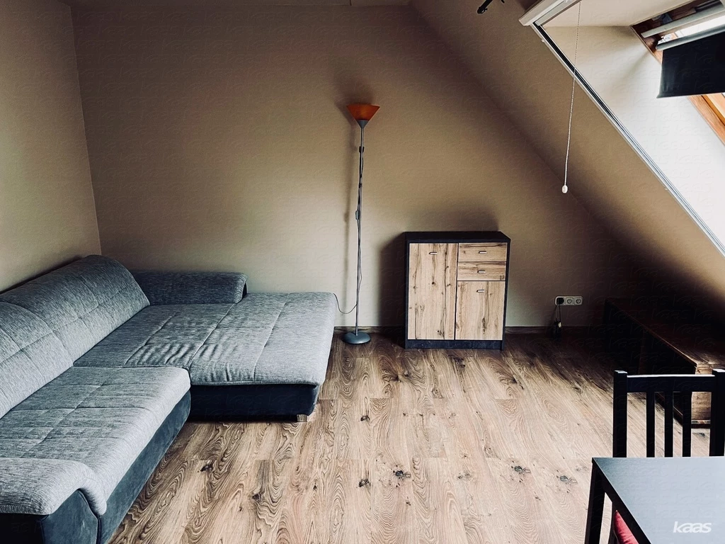 Téglalakás autóbeállóval |