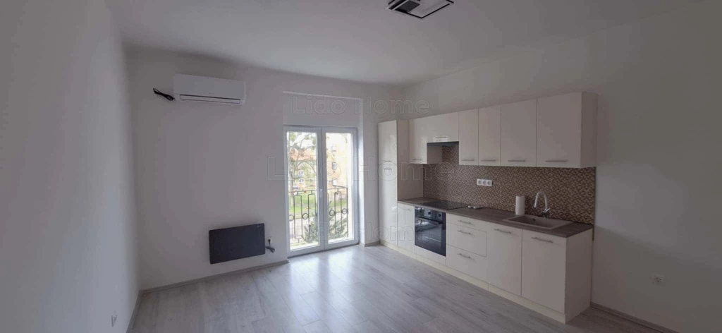 Eladó felújított tégla lakás Komlón