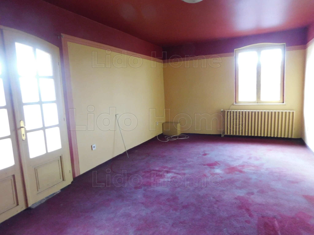 Tágas, világos, kétszintes családi ház csendes környezetben Kapospulán!