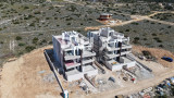 PAG SZIGET, ŠIMUNI - modern apartmanok egy csúcsminőségű új épületben, kilátással a tengerre
