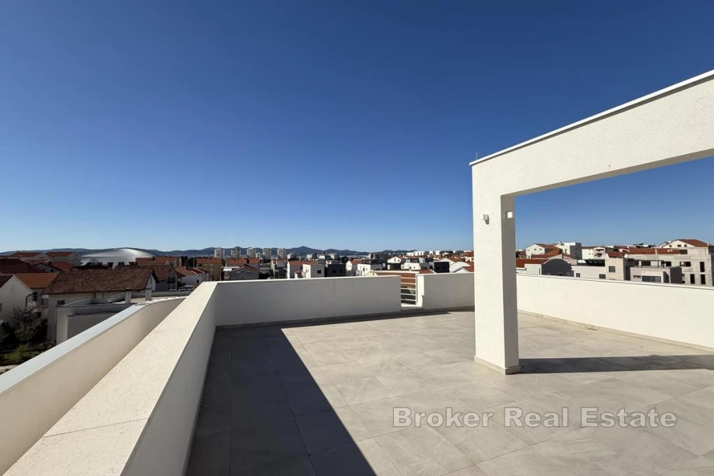 Modern apartment with roof terrace in a new building
