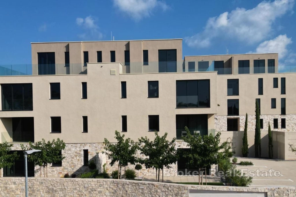 Beautiful three-bedroom duplex in a new building within a prestigious resort