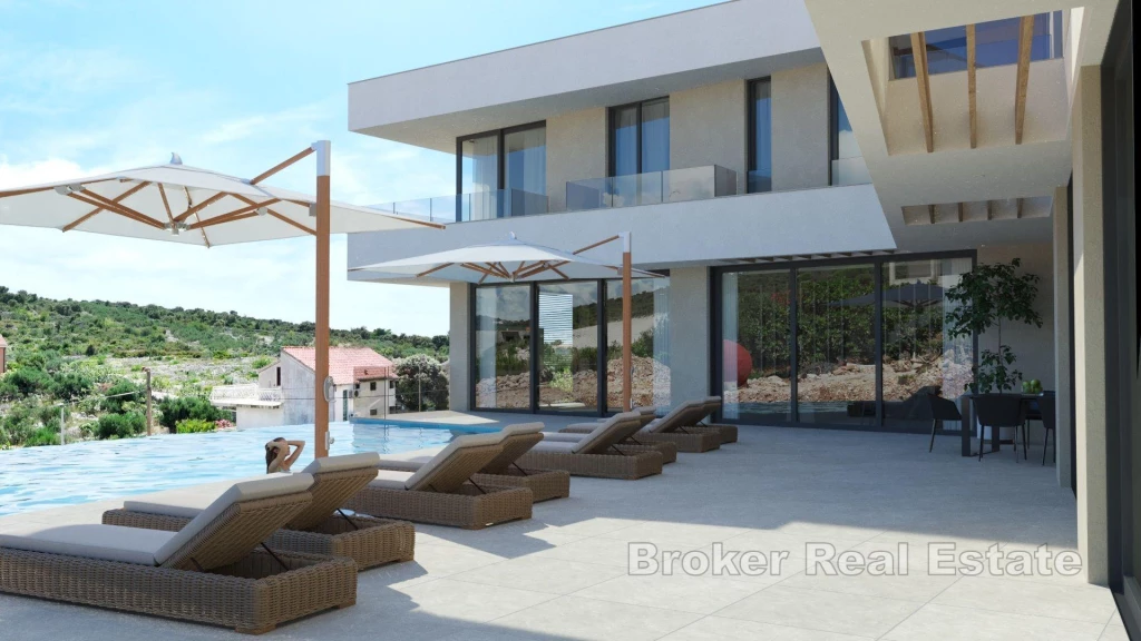 Modern villa with pool, second row from the sea