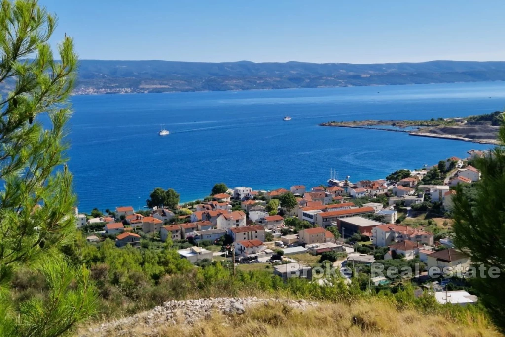 Building plot with conceptual design and sea view