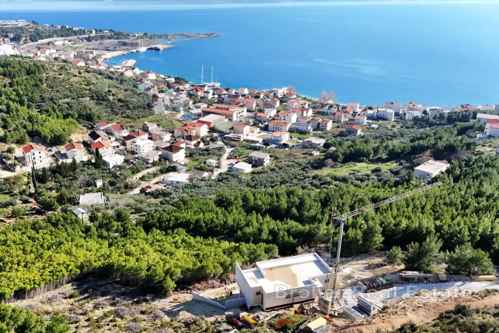 Building plot with conceptual design and sea view