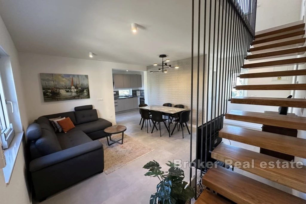 Duplex apartment with a roof terrace in a new building