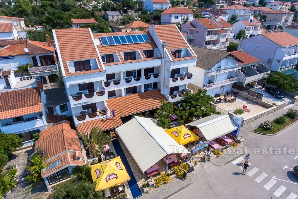 Hotel with restaurant in the first row to the sea