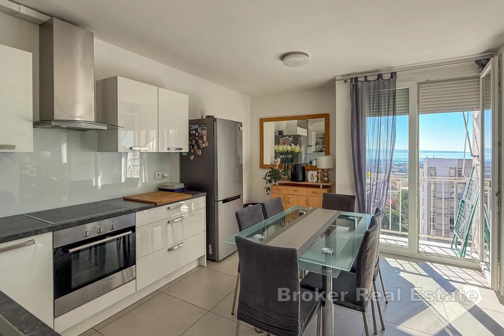 A beautiful apartment with a view of the sea and the city