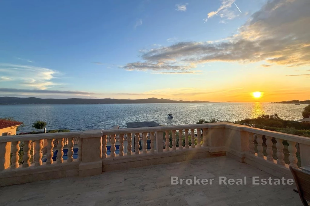 Luxury villa with building plot in the first row to the sea