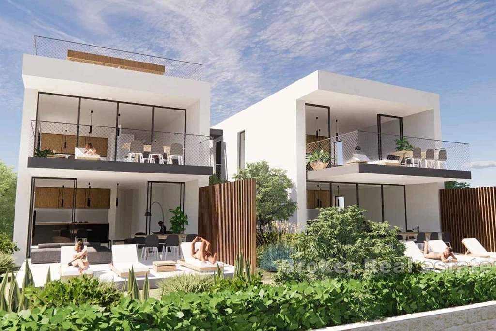 Two-story penthouse with a roof terrace and a view of the sea