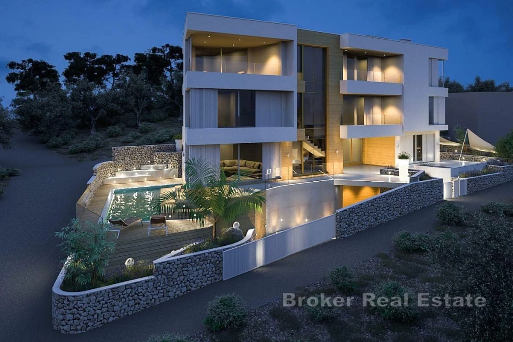 Villa in roh-bauh condition with three residential units