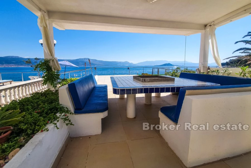 Villa on the beach with spacious terraces and sea view