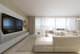 Exclusive penthouse with a swimming pool in the first row to the sea