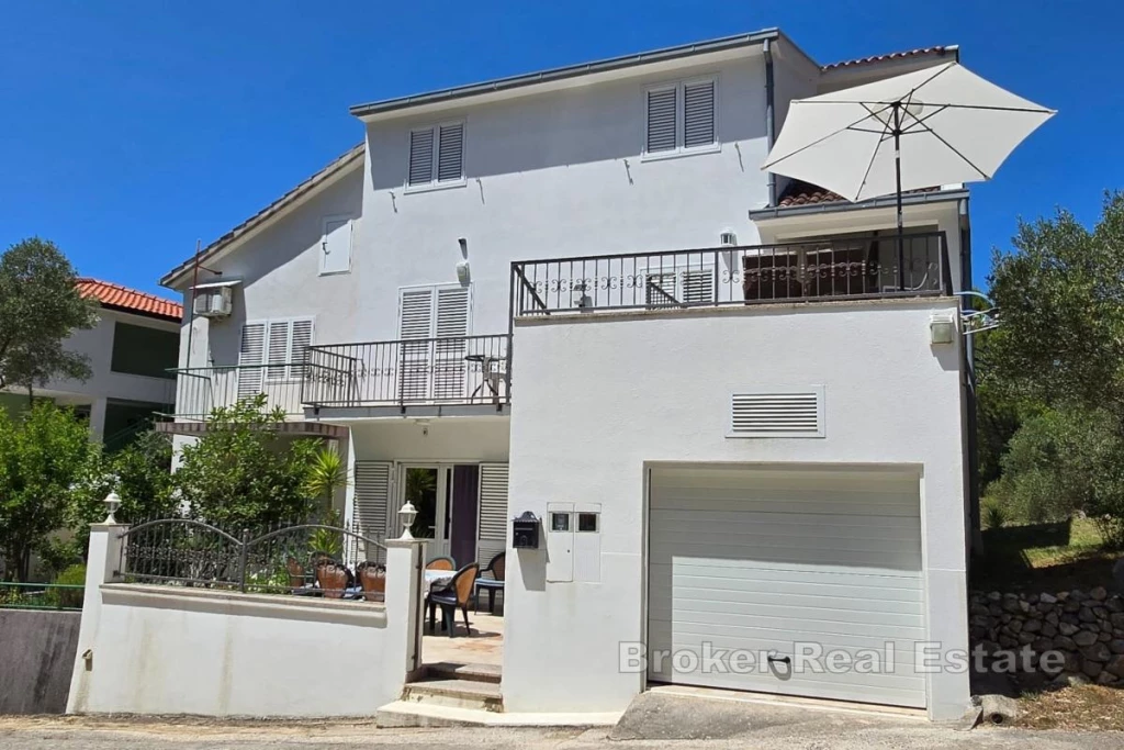 Family house with apartments close to the sea