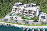 Exclusive penthouse with a roof terrace in the first row to the sea