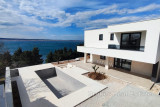Modern villa with a swimming pool in the second row to the sea