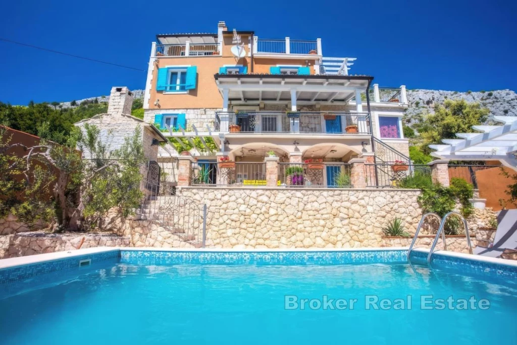 Stone house with swimming pool and open sea view