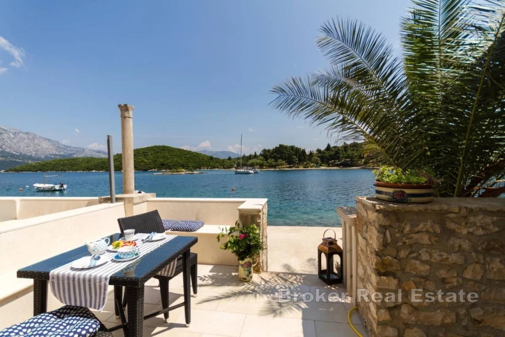 Two apartments in a stone villa right by the sea
