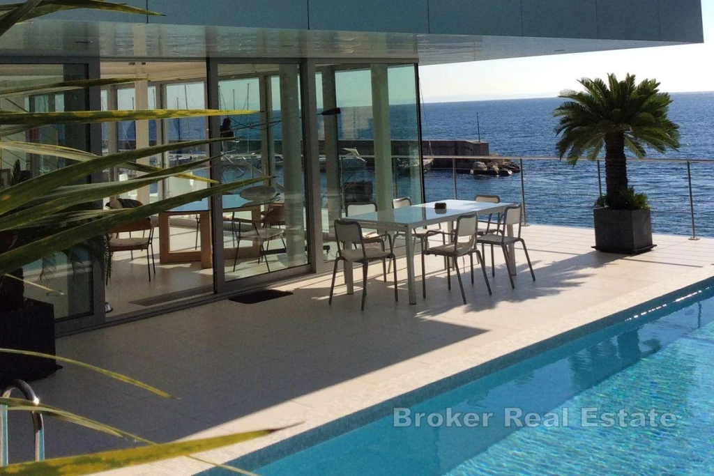 Designer villa first row to the sea