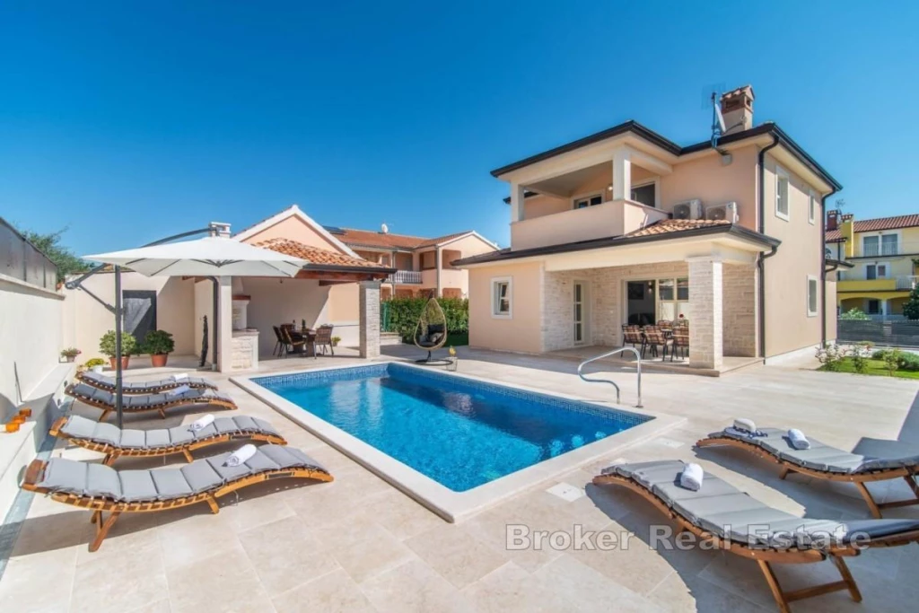 Modern villa with pool in peaceful surroundings