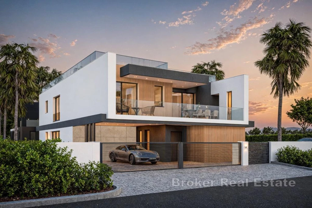 Luxury modern villa in immediate proximity to the sea, with pool and rooftop terrace