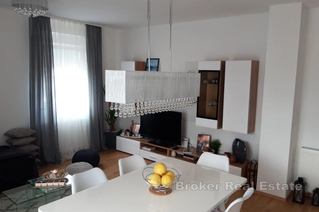 Modern two-bedroom apartment with spacious terrace in a newer building