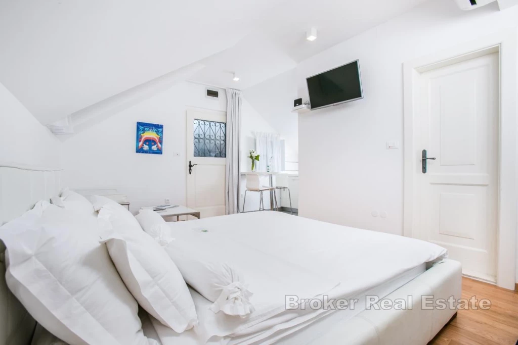 Renovated detached stone house with two units