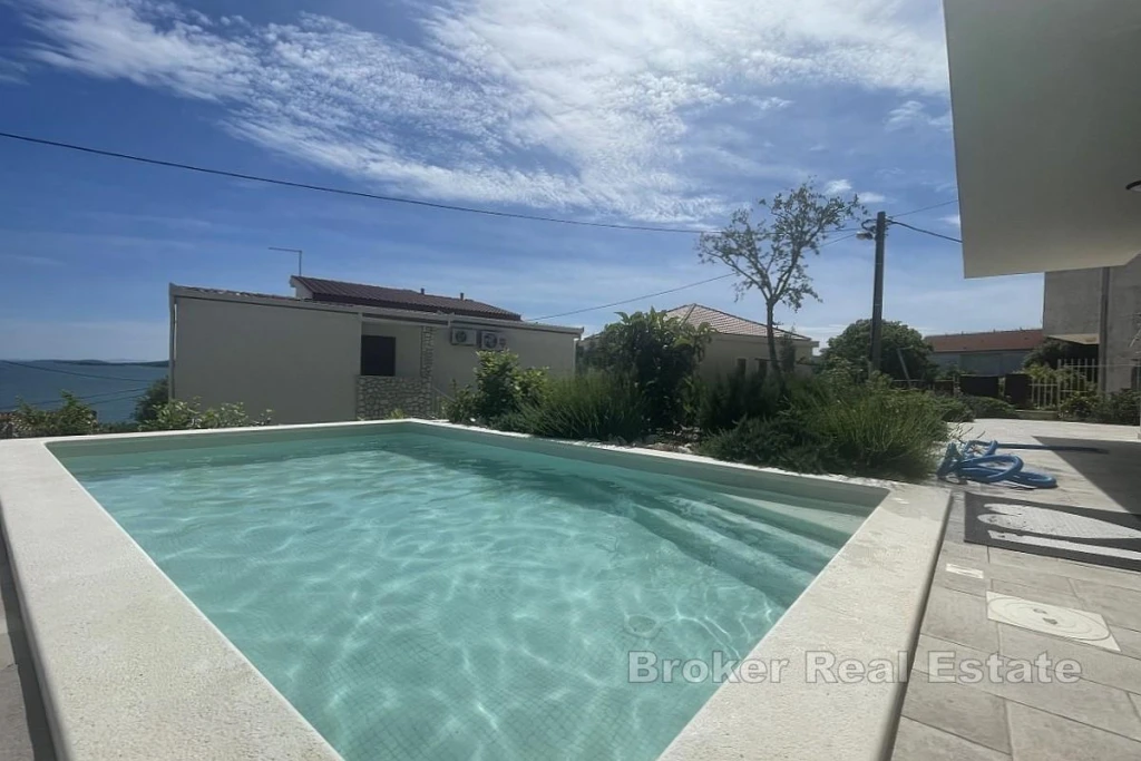 Modern two bedroom apartment with private pool and sea view