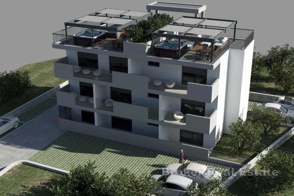 Two bedroom penthouse apartment with a roof terrace and sea view