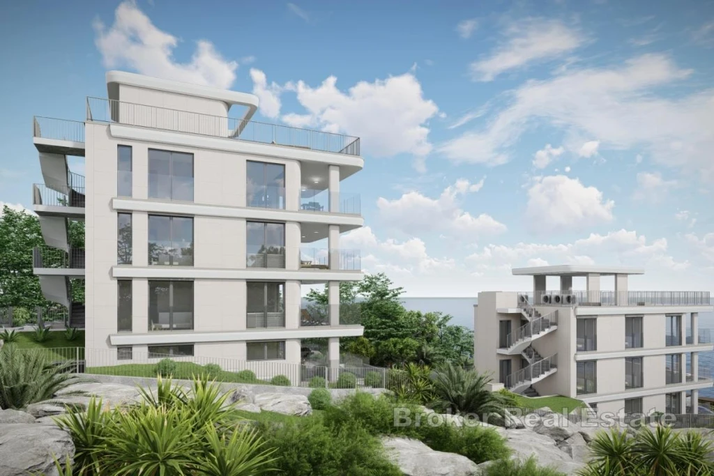 Modern apartment with garden in a new building in the second row to the sea