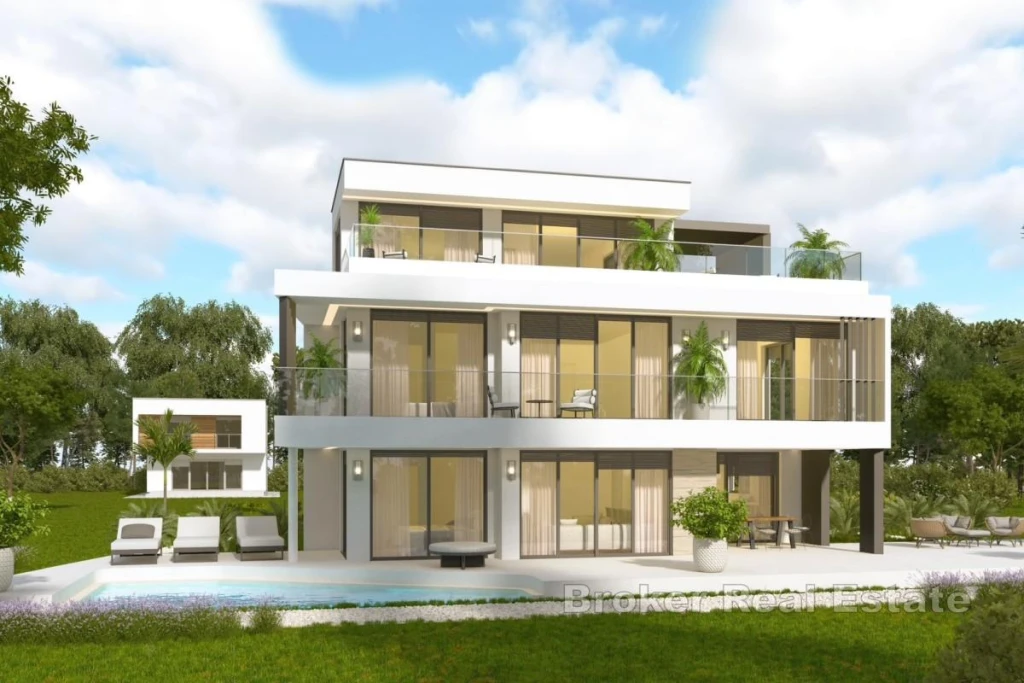 Exclusive villa on three floors with a pool and open sea view