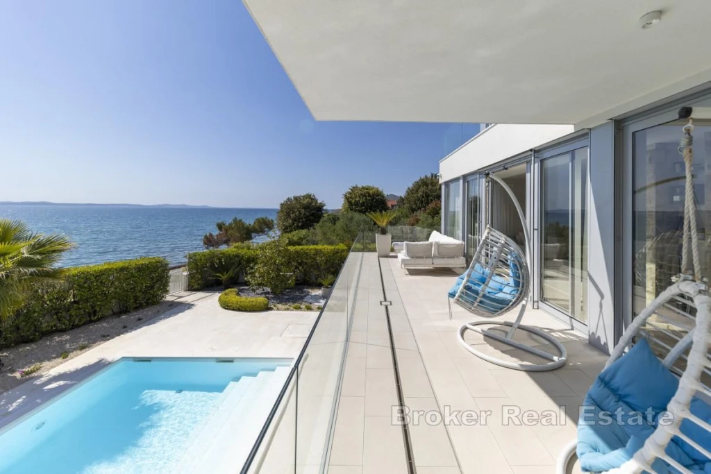 Designer villa in a prime seafront location