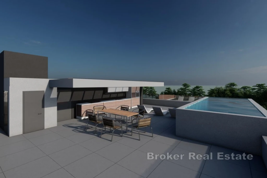 Penthouse with pool and rooftop terrace by the sea