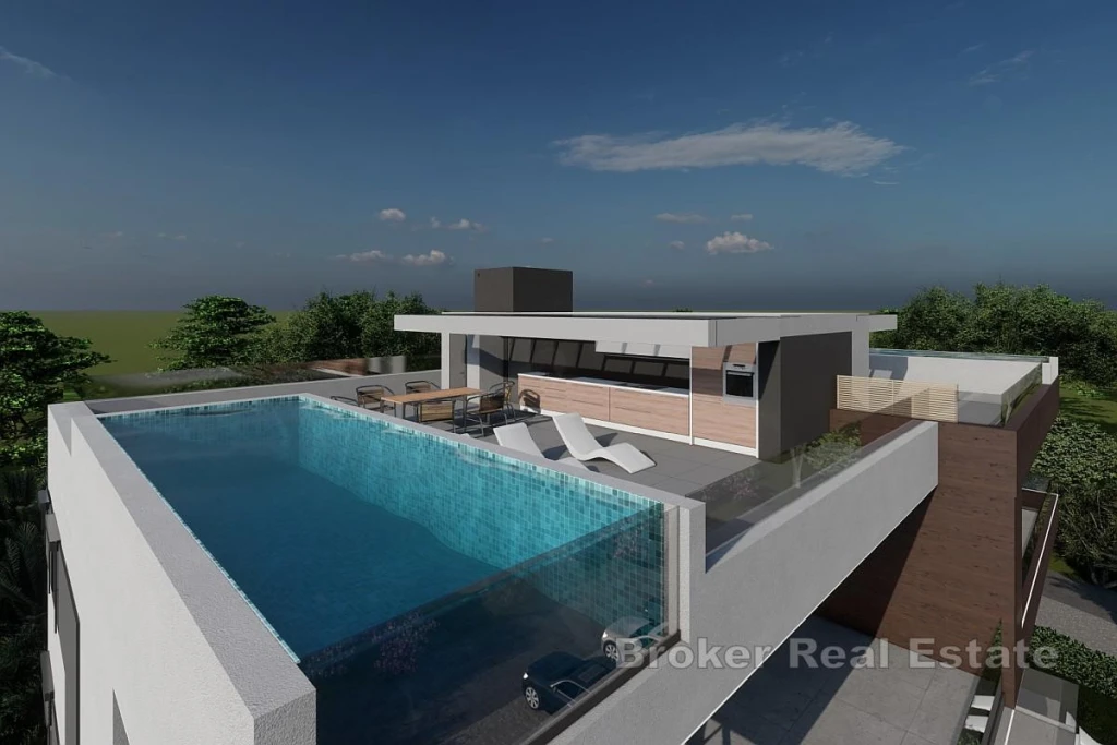 Penthouse with pool and rooftop terrace near the sea