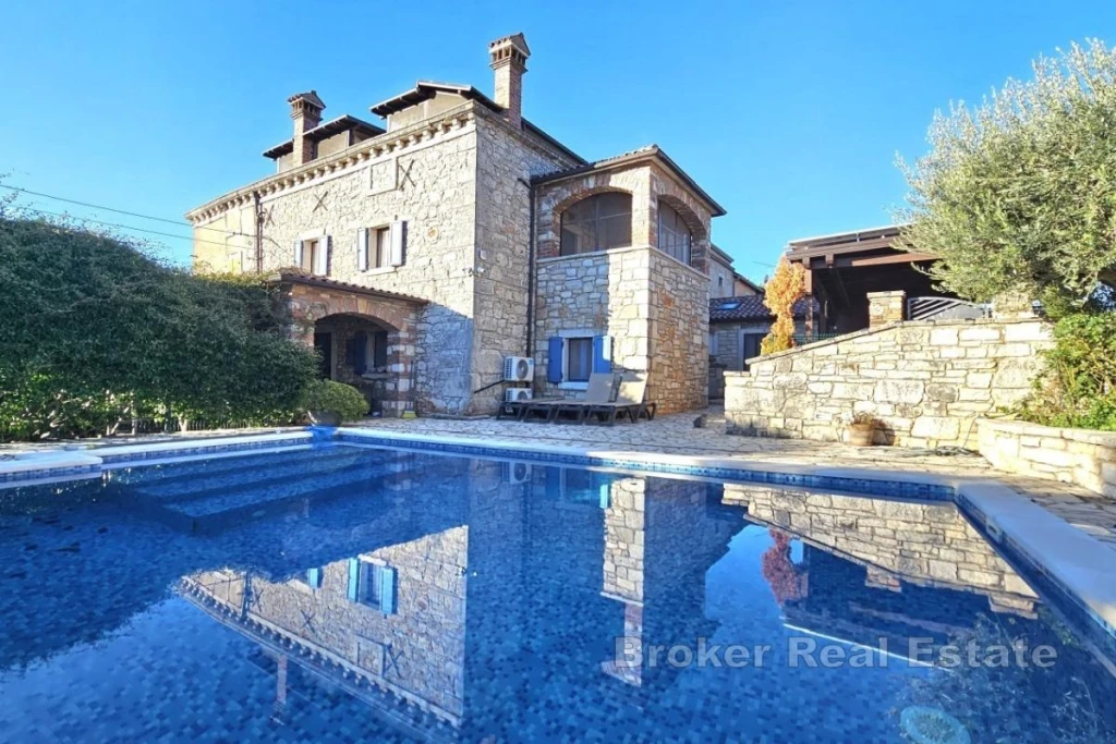 Stone house with swimming pool, wellness facilities and solar system