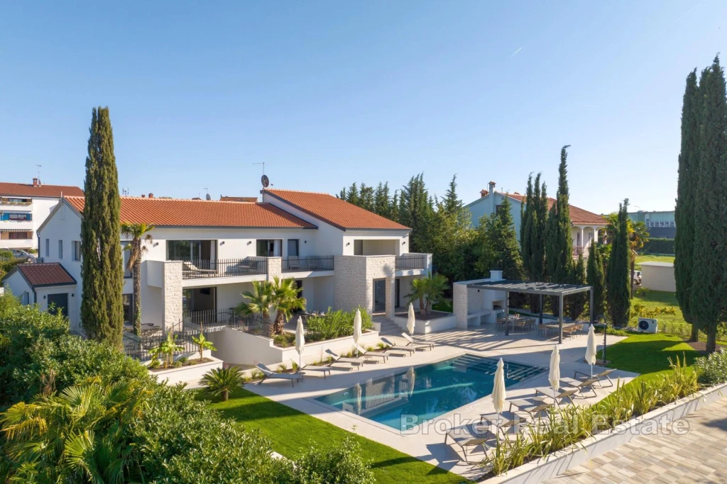 Luxury villa with three units and heated pool