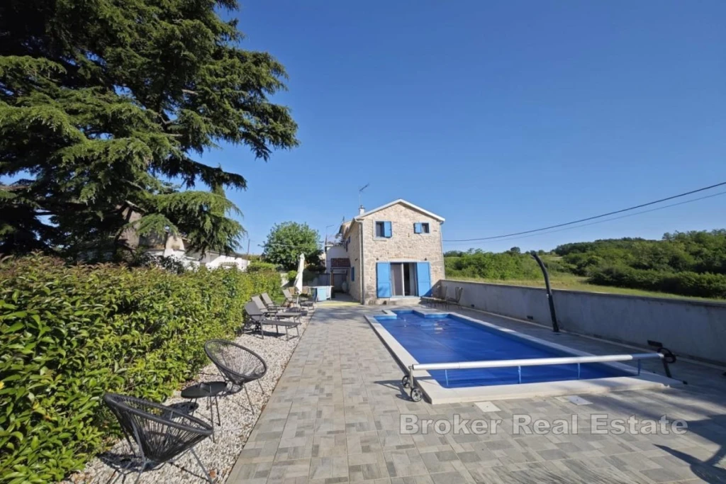 Renovated semi-detached stone house with a pool