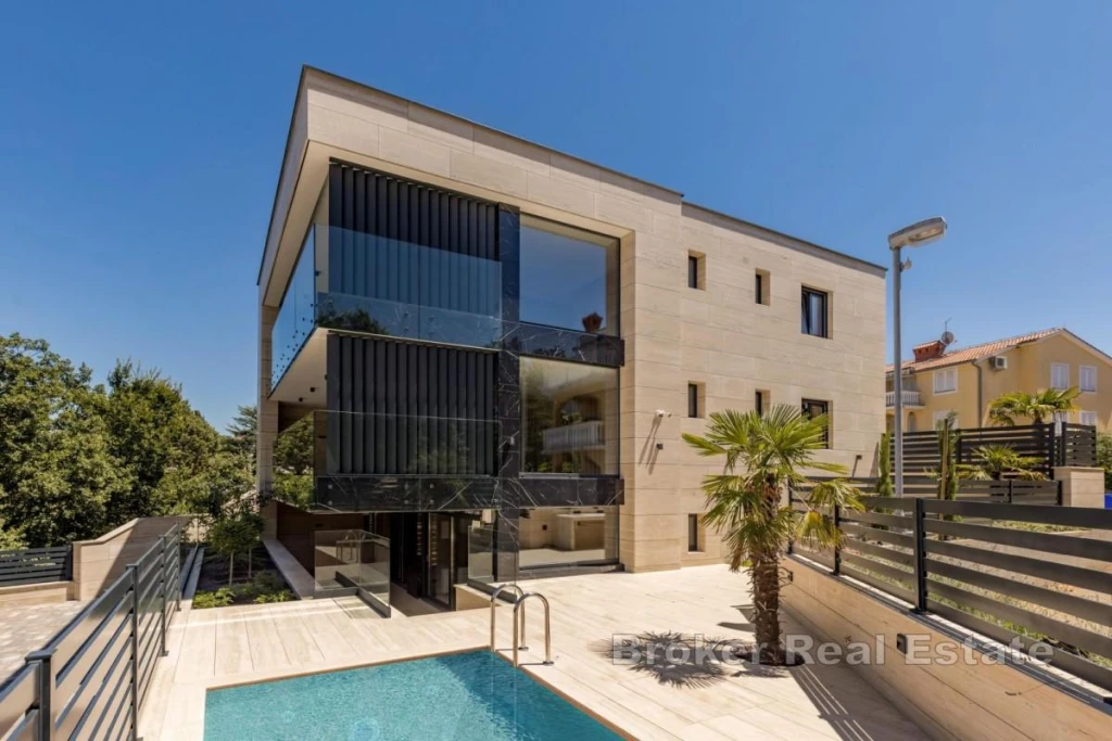 Apartment with a Swimming Pool in a Modern Villa Near the Sea