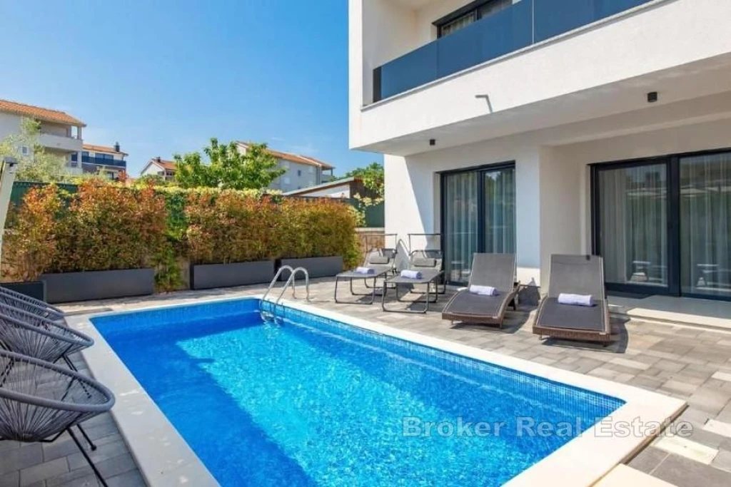 Semi-detached house with a swimming pool near the sea