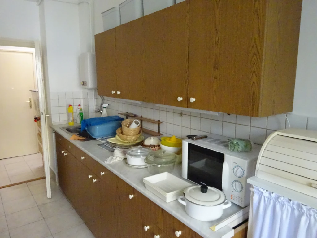 Belvároshóz közel, fődszinti téglalakás eladó